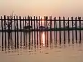 Monks Crossing U Bein Bridge at Sunset