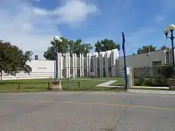 An Art Deco fairgrounds building painted white