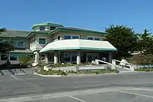 collection of small buildings on the Pacific coast