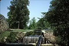 A small aqueduct crosses the old canal lock