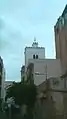 The minaret of the mosque seen from El Sabkha Street