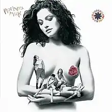 a black and white photograph of the band sprawled across the arms of a proportionately larger naked woman. A rose conceals one of her nipples while singer Anthony Kiedis' standing body conceals the other.