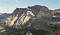 Southeast aspect of Mount Cannon rises above Hidden Lake.