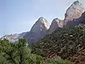 Mountain of the Sun (centered) seen from SW with Twin Brothers (right)