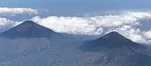 Mount Sumbing (left) and Mount Sindoro (Sundoro) (right) seen from the sky by plane.