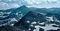 Top of Mount Izaak Walton (centered, foreground) with Red and White Mountain (left of center). View from Evon Benchmark.