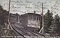 The railway's two cars passing each other in this circa 1905 postcard