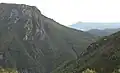 Mount Huxley showing rocky outcrop on the south face above the King River Gorge.