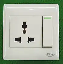 A so-called "universal socket", which meets no official standard but is intended to accept a number of different plug types