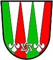 Janner (England): Paly of four vert and gules a pile terminating in a triangle interlaced with a triangle reversed between two piles each terminating in a fleur-de-lis argent.