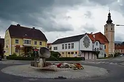 Former municipal office of Ganz, the old church hall, rectory and parish church St. Cunigunde in 2014