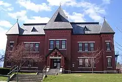 The Gothic Revival Municipal Center (1884), built as Brattleboro's High School, served the town in that capacity until 1951