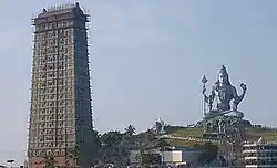 Gopura of Murudeshwara Temple and statue of Shiva