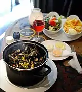 Mussels (Mosselen met friet) are usually served with chips and dipping sauces