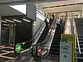 Escalators leading from Surian Link to the station.