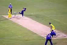 Muttiah Muralitharan bowls to Adam Gilchrist in a one-day international at Brisbane. Gilchrist went on to hit a century off 67 balls. Muralitharan finally bowled him for 122.