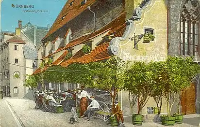 The Bratwurst Glöcklein ("Little-bell sausages"), Germany's most renowned inn of the time, founded in Nuremberg in the 14th century. The inn was destroyed in the Second World War. 1914 postcard.