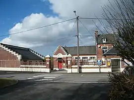 The town hall and school in Neufmoulin