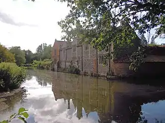 The east facing facade and the moat.