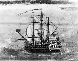  A sail warship at sea flying a US flag.