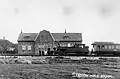 NS 7109 (NFLS No. 9) with a train along the platform of the Anjum station. (Between 1913 and 1920)