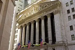 A tall colonnade in front of the building's main facade at 18 Broad Street