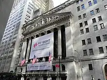 The adjacent 20 Broad Street building, original 18 Broad Street structure, and 11 Wall Street annex, seen from left to right