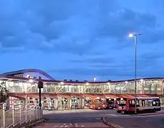 Mansfield bus station with the turf-roof of Queen's Place low-energy building visible behind