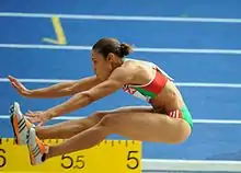 Image 8Naide Gomes in the jumping phase of the event (from Track and field)