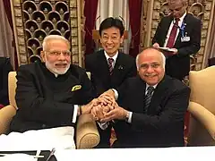 Ryuko Hira with Prime Minister of India H.E. Narendra Modi and Minister of Economy, Trade, and Industry of Japan H.E. Yasutoshi Nishimura