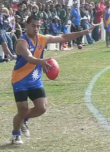 Yoshi Harris kicks for goal during the 2008 Australian Football International Cup