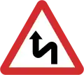 B12: Double bend ahead first to the left