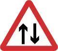 B21: Two-way traffic straight ahead