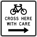 (A43-3) Cyclists Cross Here With Care (to the right)