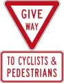 Give way to Cyclists and Pedestrians