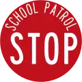 (R2-4) School Patrol Stop (used by crossing wardens when children are crossing the street, vehicles must stop)