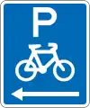 (R6-52.1) Cycle Parking (on the left of this sign)