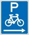 (R6-52.1) Cycle Parking (on the right of this sign)