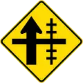 (W15-1A/PW-13a) Railway level crossing on side road to right