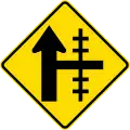 (W15-1B/PW-13b) Railway level crossing on side road to right