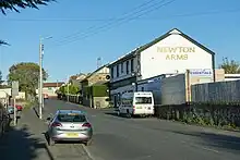 Image looking east up Westburn Road to Local Pub as of late 2018 with small amenities shop