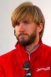 Nick Heidfeld answering questions to the assembled press