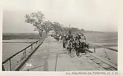 Nida bridge in Motkowice with horse-drawn, k.u.k, narrow gauge railway, 24 May  1915
