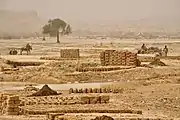 Brick making on the outskirts of town