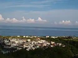 Ningpu Village, with the Pacific Ocean in the background