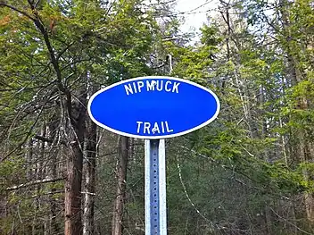 Nipmuck Trail sign on CT-171 outside Bigelow Hollow State Park.