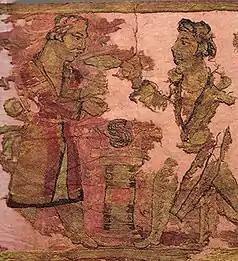 Yuezhi nobleman and priest over fire altar. Noin-Ula carpet.