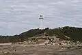 Looking back at the lighthouse from the rock platform