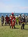 Reenactors with kite shields