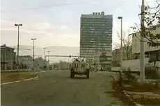 Image 9UN troops in front of the Executive Council Building, burned after being struck by tank fire during the siege of Sarajevo, 1995 (from Bosnia and Herzegovina)